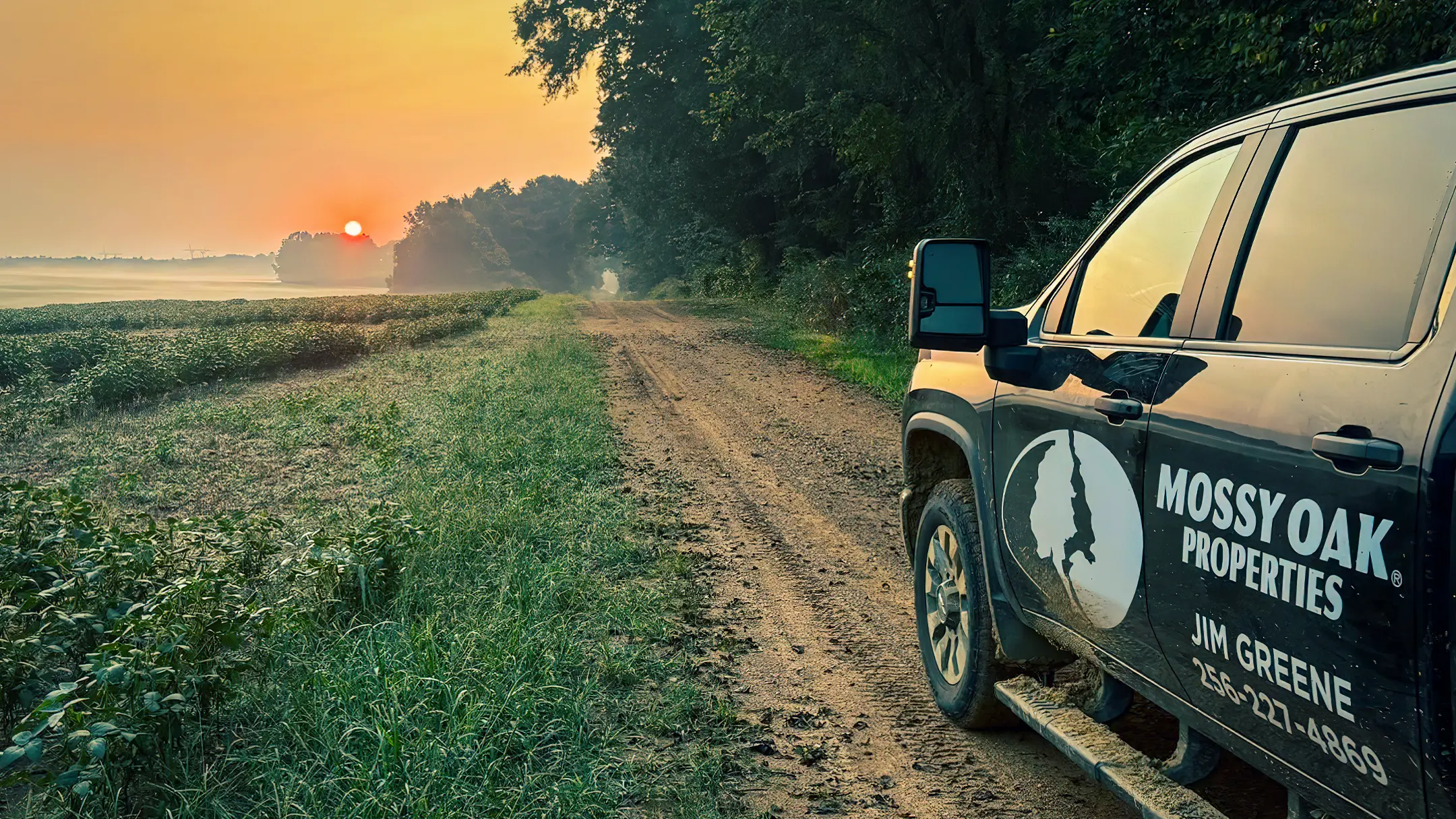 Jim Greene, Mossy Oak Properties Vehicle overlooking rural property for residential, farming, or hunting