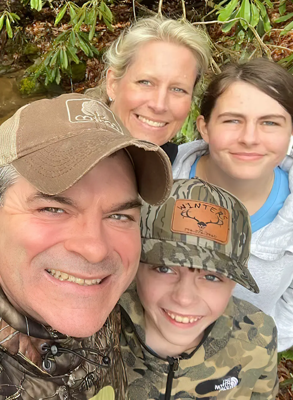 Jim Greene with his wife and two children